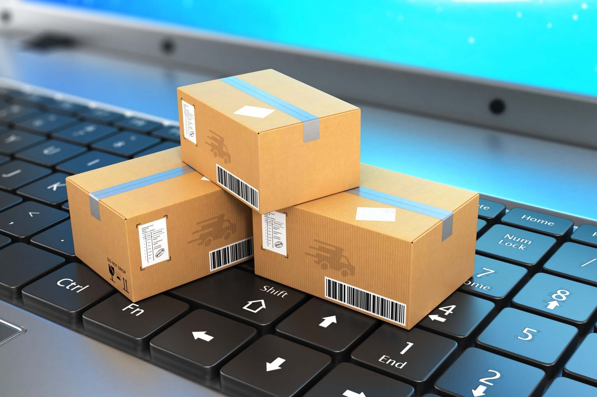 Shipping boxes on a computer keyboard
